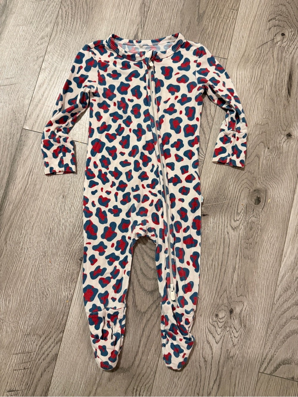Posh Peanut Cream Footed One-Piece with Red & Blue Spot Print
